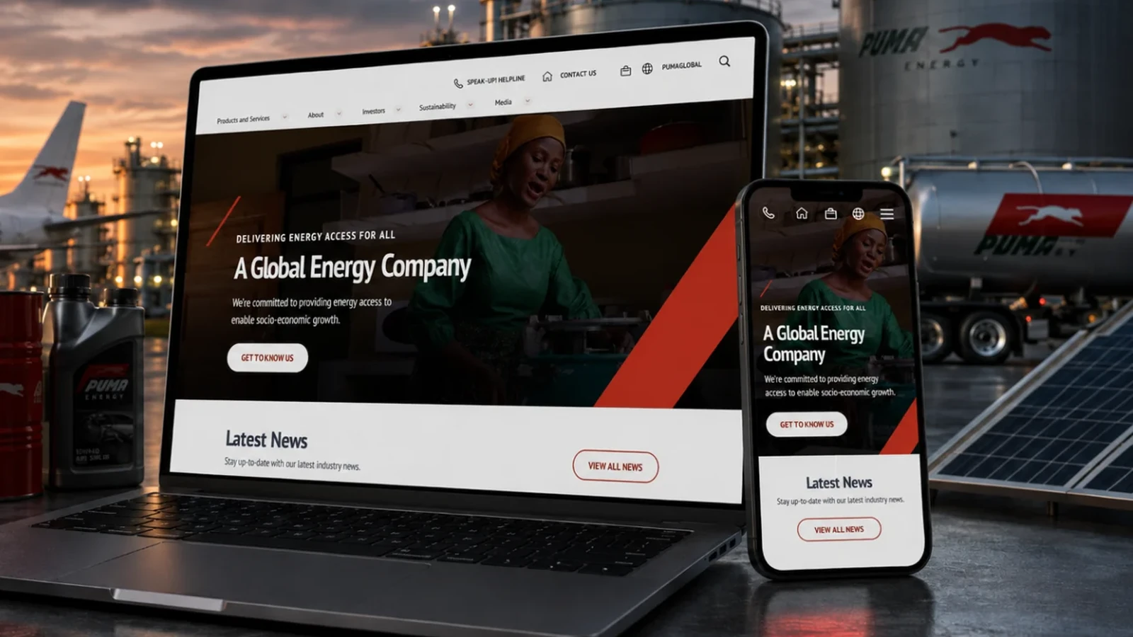 Puma Energy’s corporate site shown on a laptop and a phone in front of a fuel terminal, tanker and lubricant packs